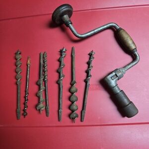 Antique Pexto Metal Hand Drill with 7 Bits.